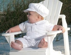 Baby boy's white romper suit