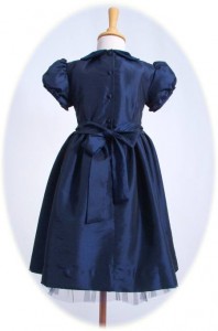 Child's smocked party dress back view