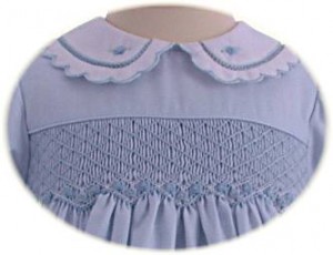 Baby's smocked winter dress detail